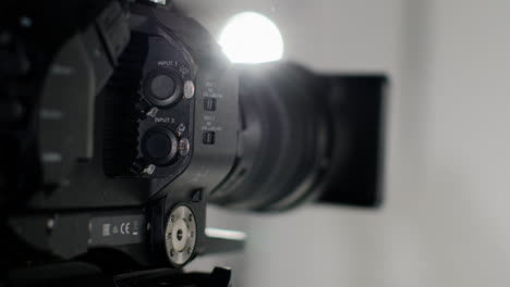 Close-Up-Of-Film-Or-Video-Camera-Shooting-Movie-Or-Video-In-Studio